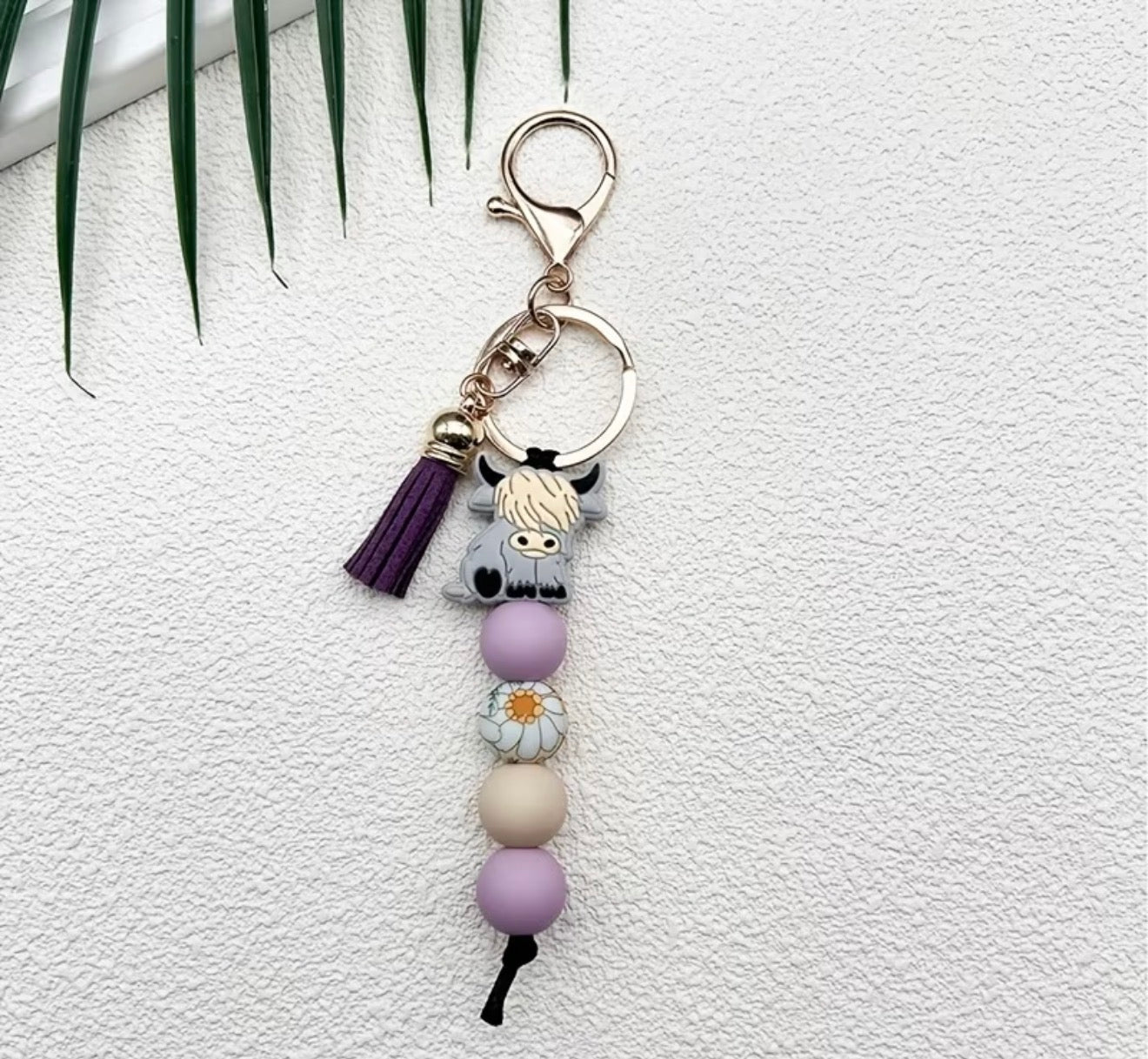 Porte-clés perlé avec vache Highlands