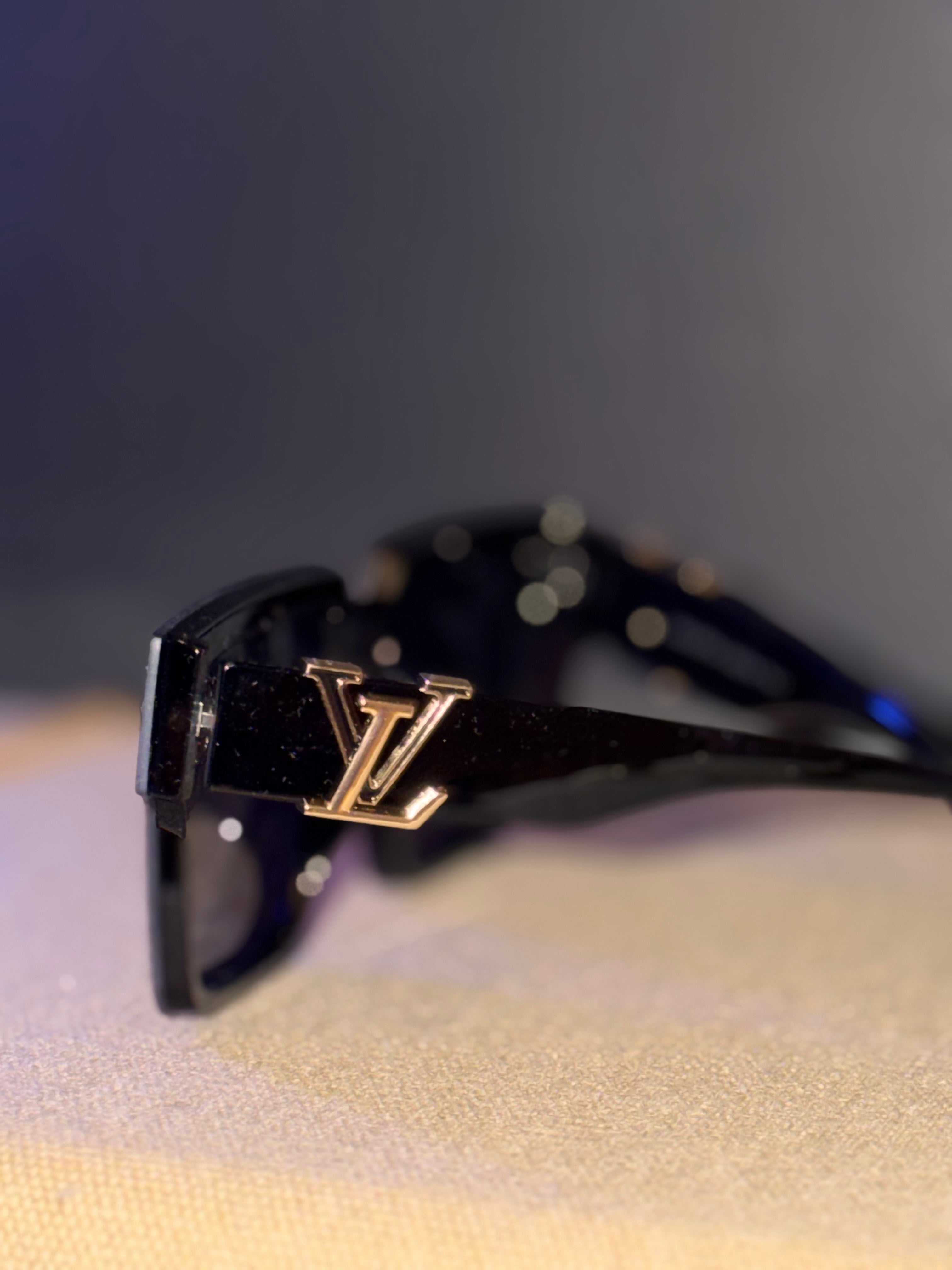 Ces lunettes de soleil Louis Vuitton