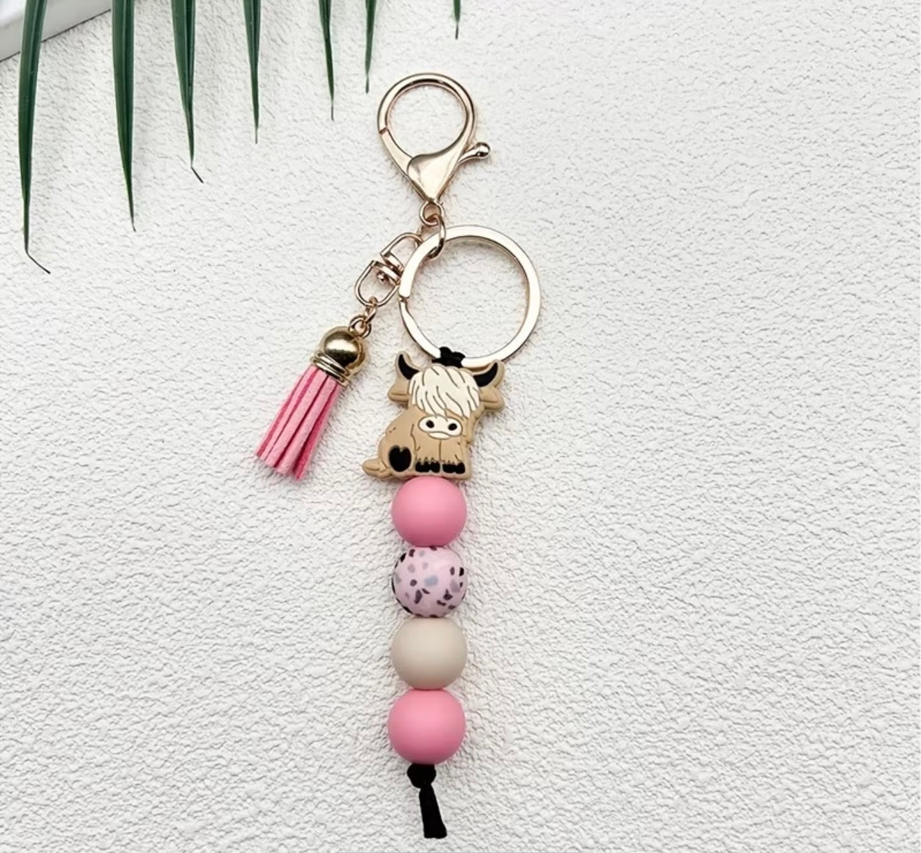 Porte-clés perlé avec vache Highlands